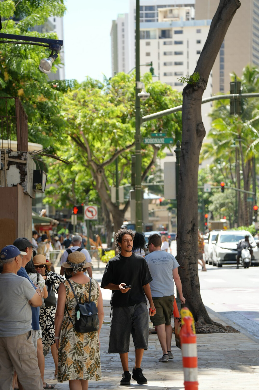 people commuting in city street