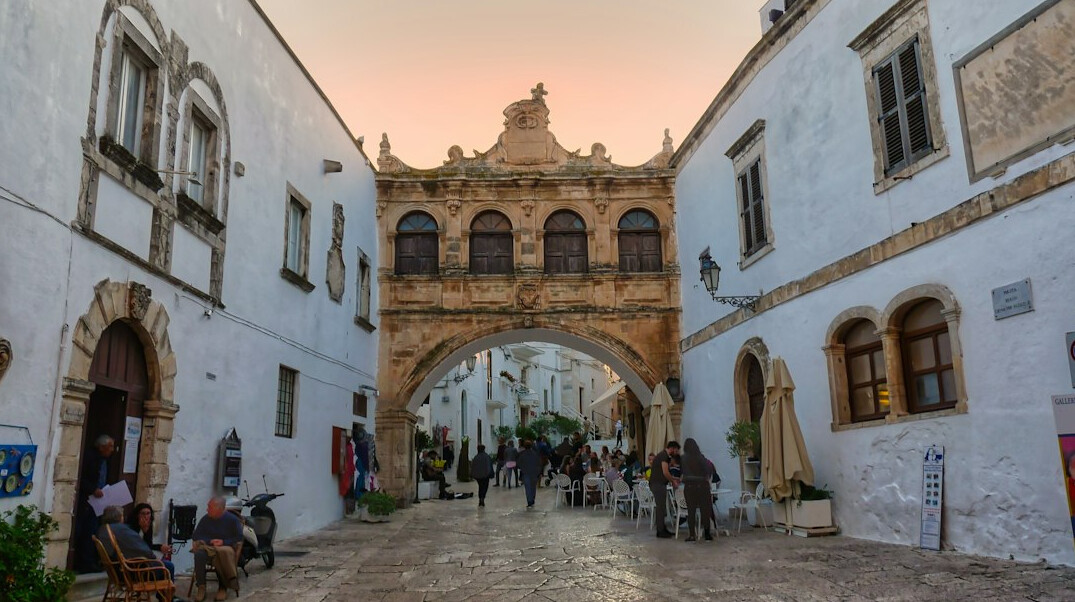 people in old city square